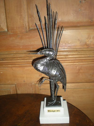 Heron by Reeds